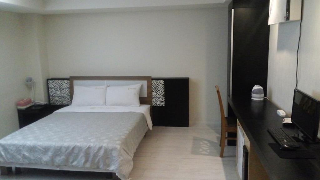 Geoje Win Hotel Pokoj fotografie